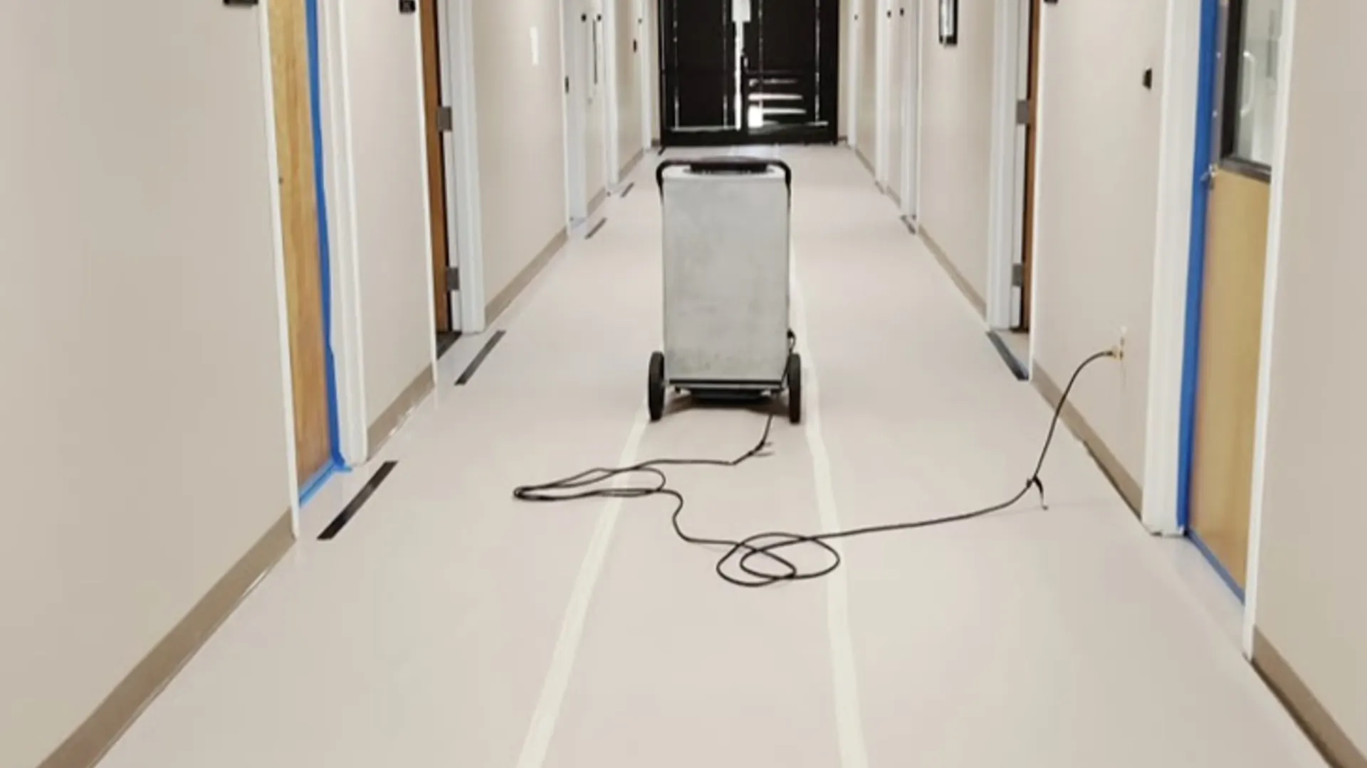 HEPA air scrubber running inside a sealed room during contents mold cleaning