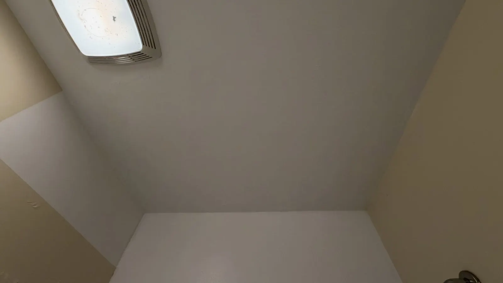 Clean bathroom ceiling after mold remediation
